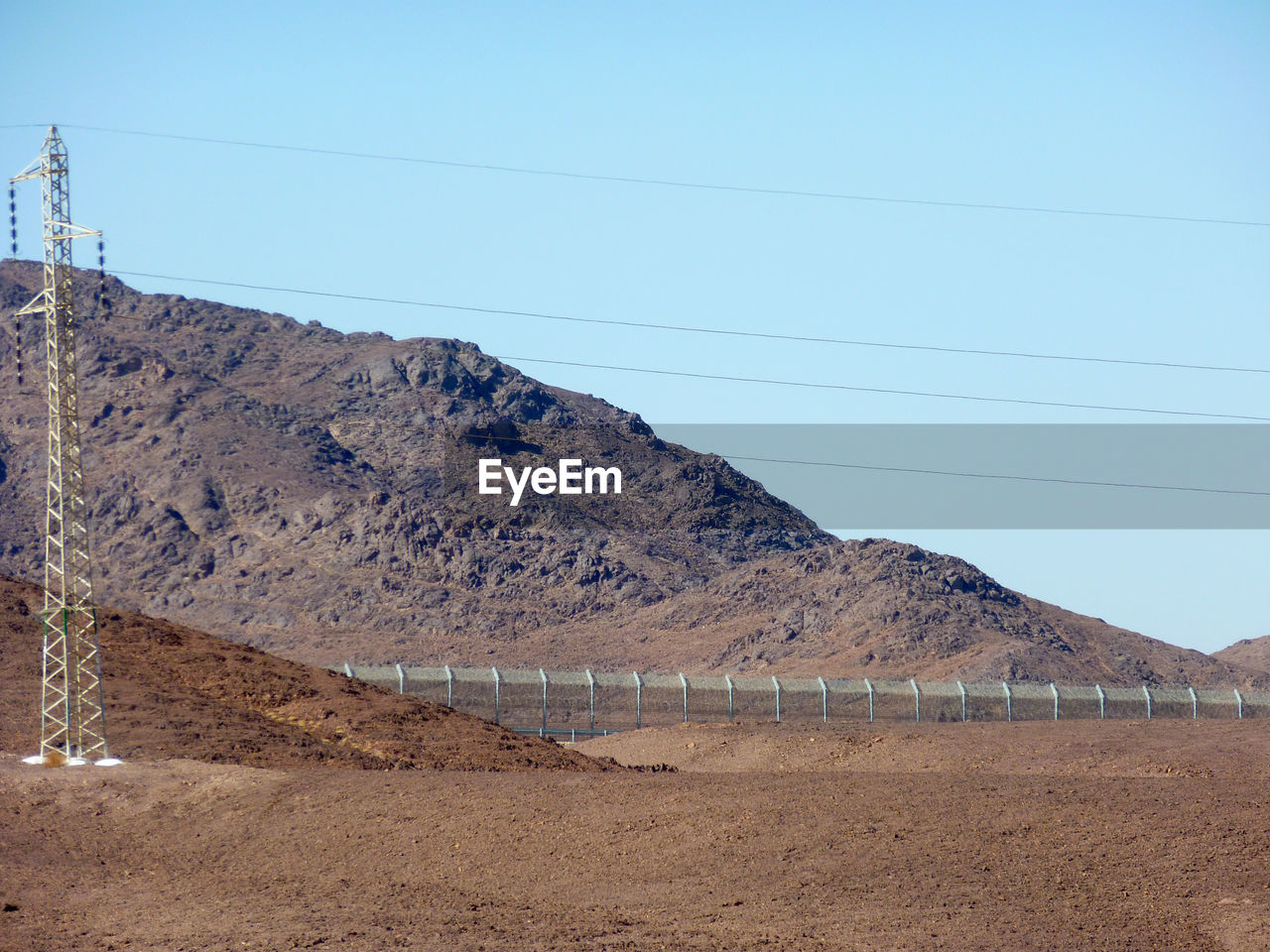 Scenic view of mountains against clear sky