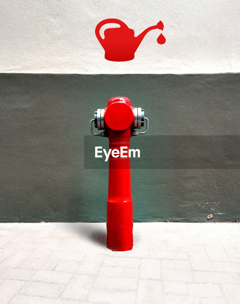 RED FIRE HYDRANT ON FOOTPATH