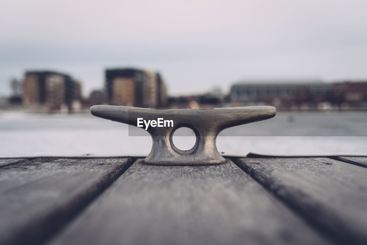 Close-up of cleat on pier