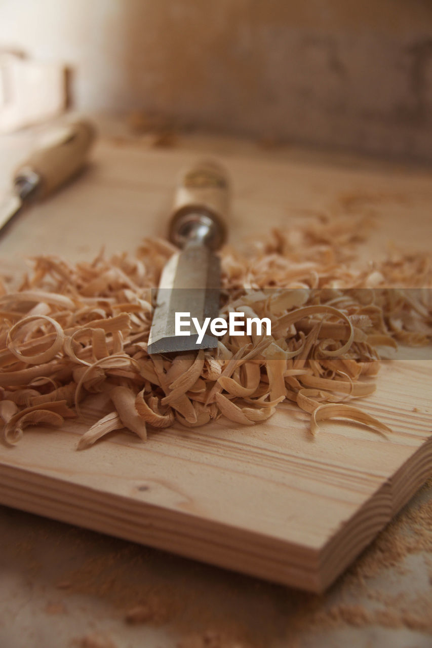 Close-up of wood shaving on cutting board