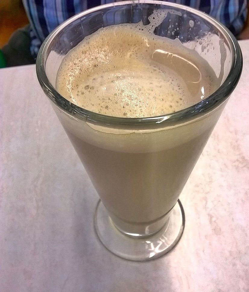 CLOSE-UP OF COFFEE CUP WITH COFFEE CUP