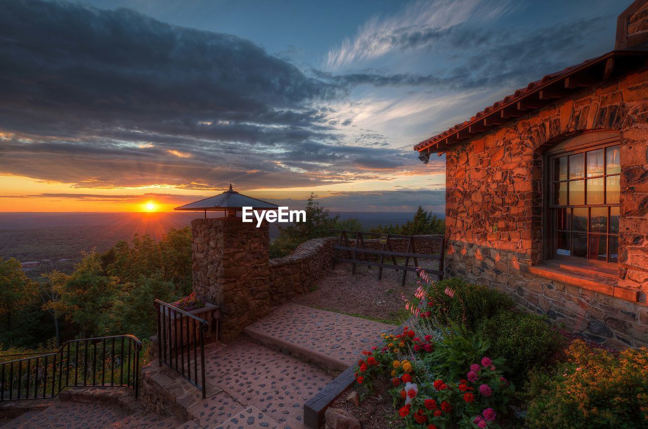 House against sky during sunset