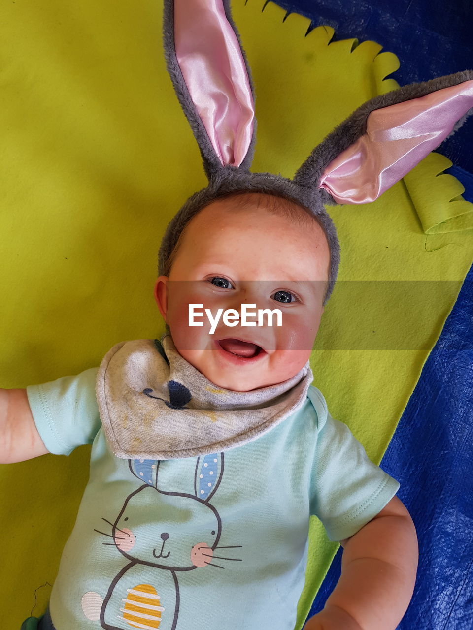 Portrait of smiling baby boy wearing costume rabbit ears