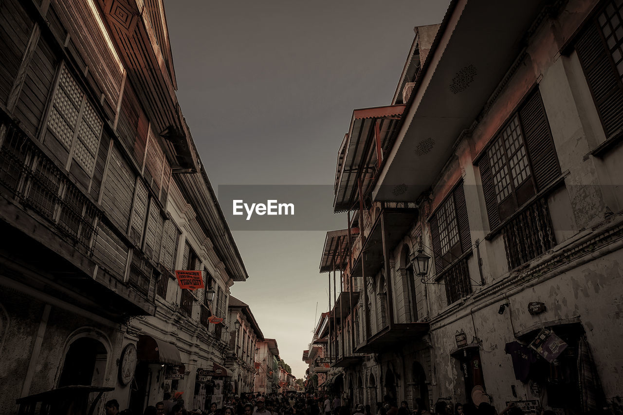 Low angle view of old buildings against sky