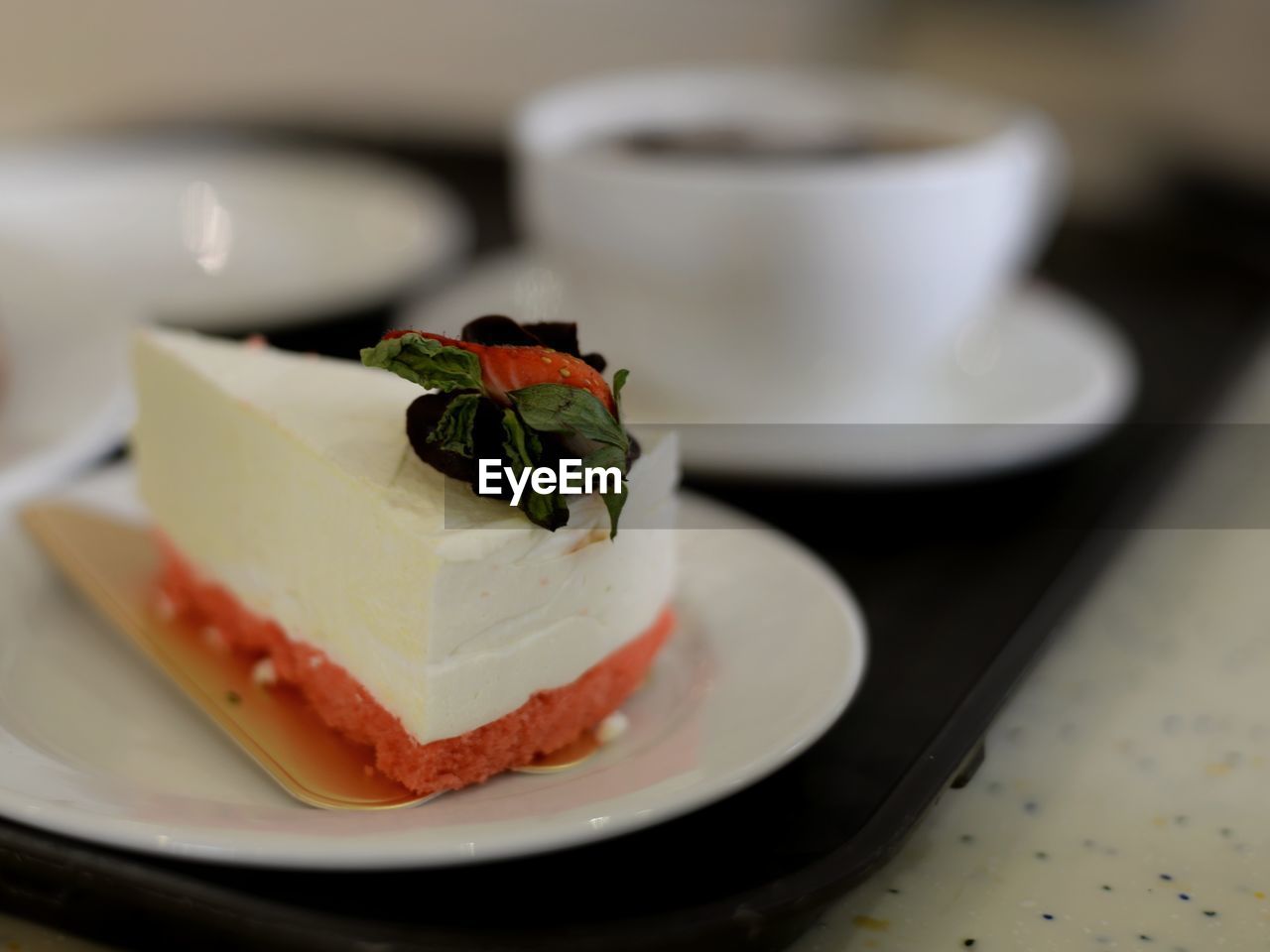 CLOSE-UP OF CAKE SERVED IN PLATE