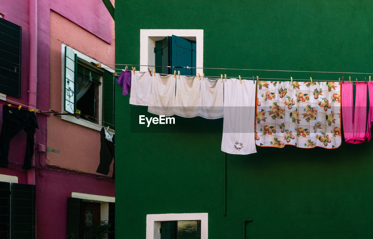 Clothes drying on clothesline in burano, venice, italy