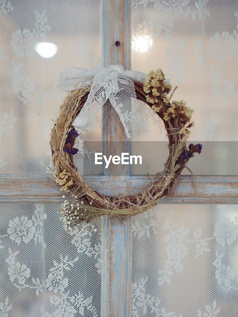 Wreath hanging against wall