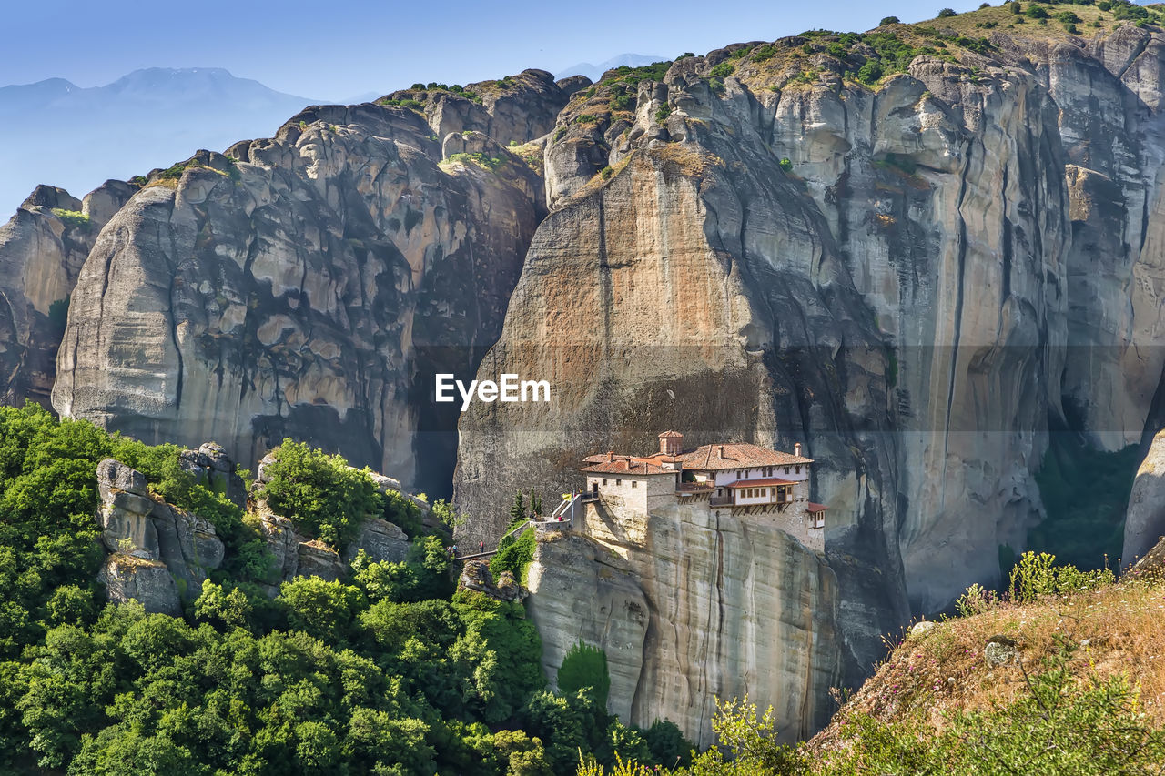 View of rocks with monastery of rousanou in meteora, greece