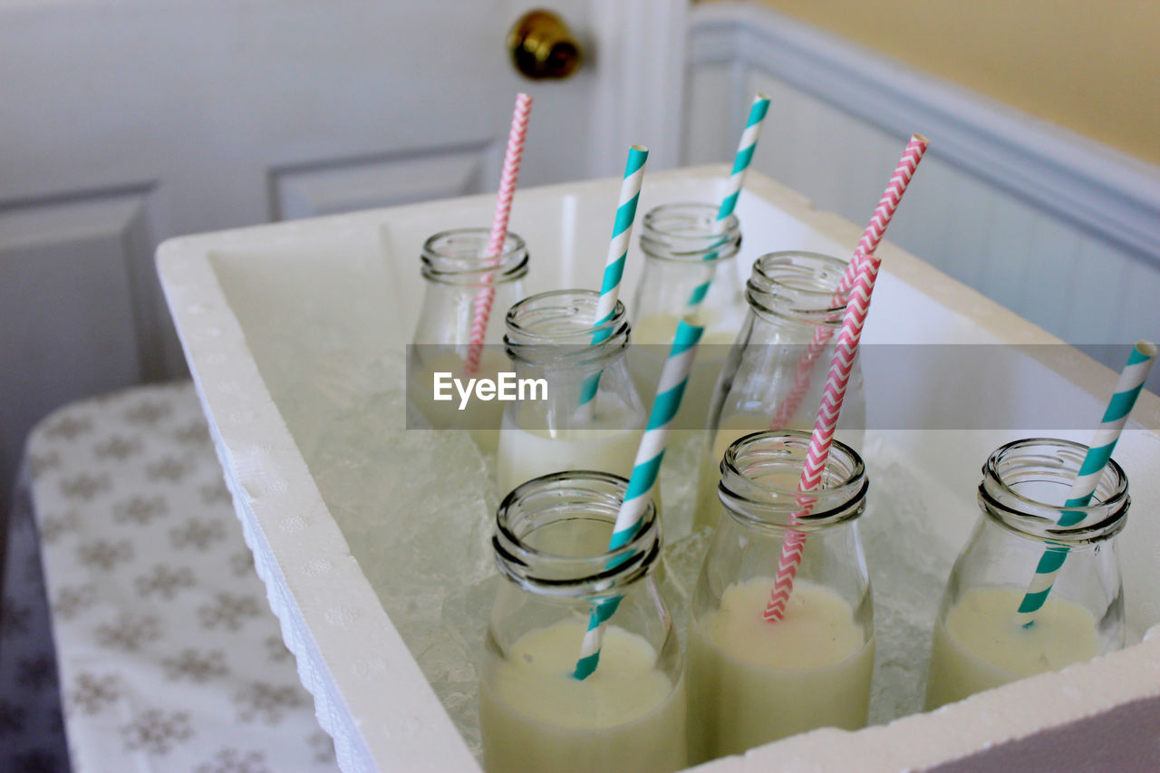 High angle view of bottles on table