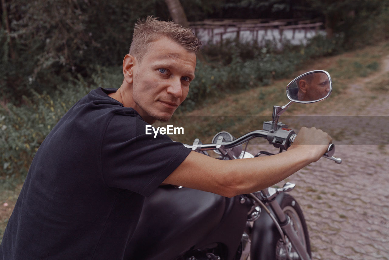 Portrait of man riding motorcycle