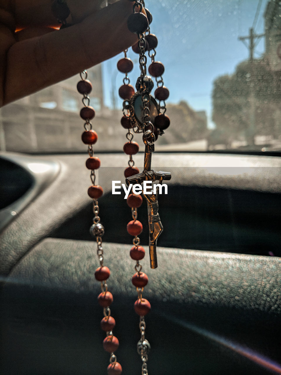 Close-up of chain hanging on metal