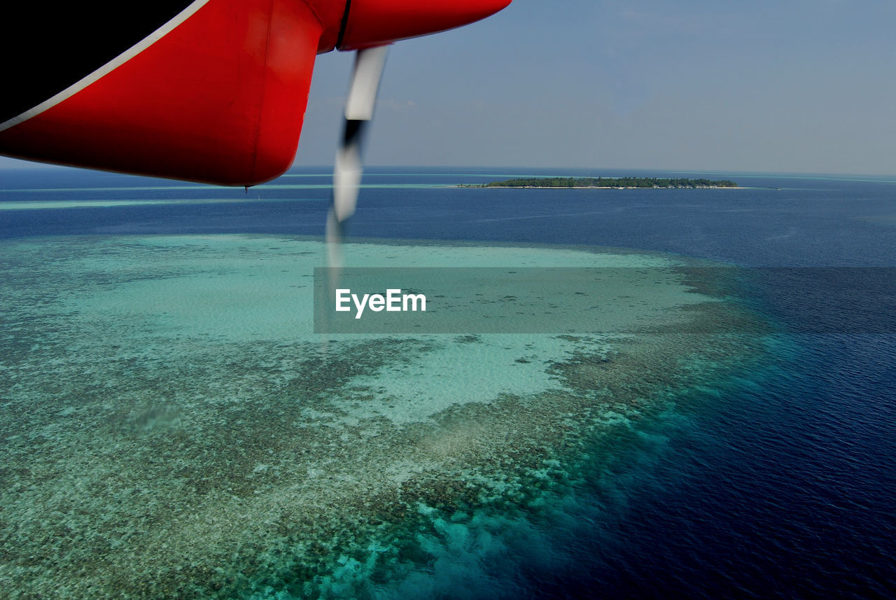 Scenic view of sea from airplane 