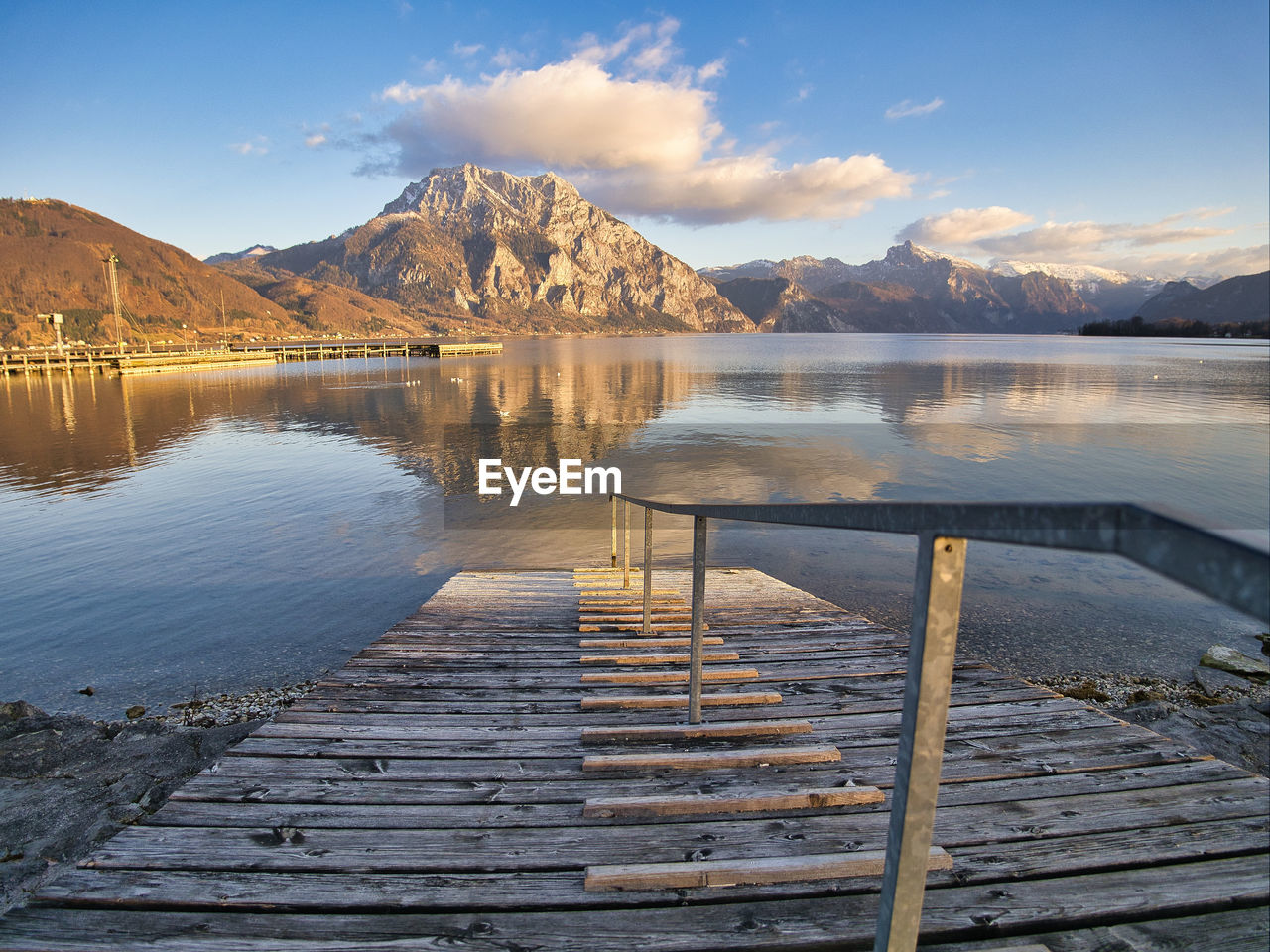 SCENIC VIEW OF LAKE AGAINST MOUNTAIN RANGE