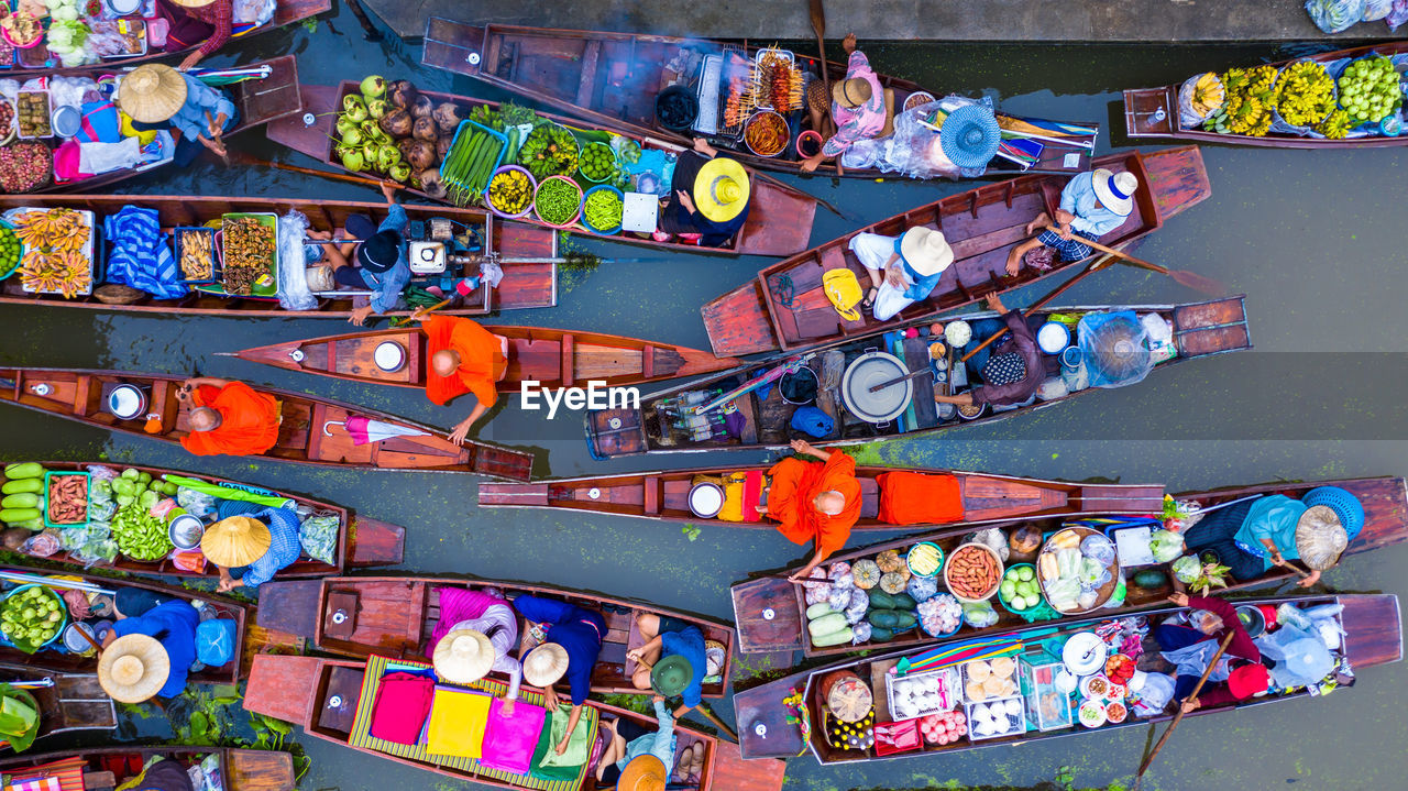 Aerial view of floating market in river