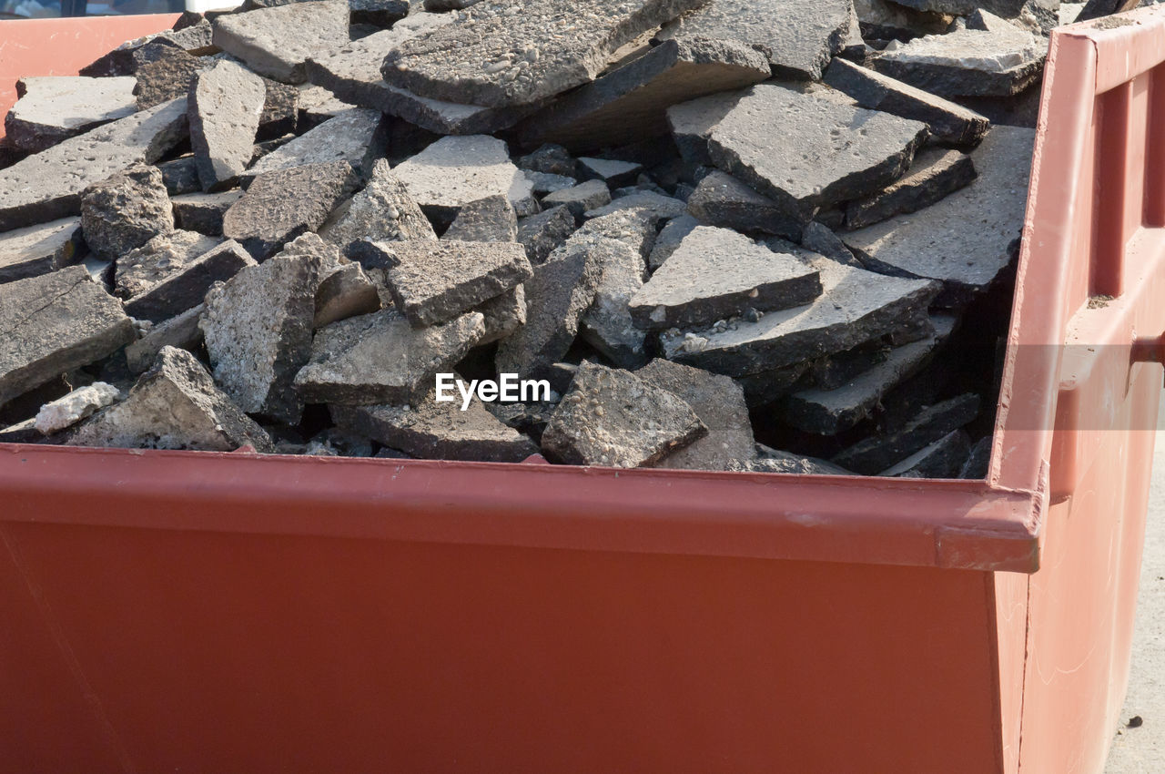 Close-up of stones in container