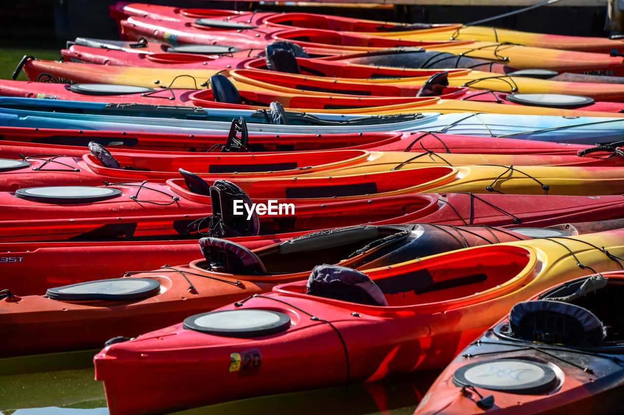 Kayaking and paddle boards gathered at the pier