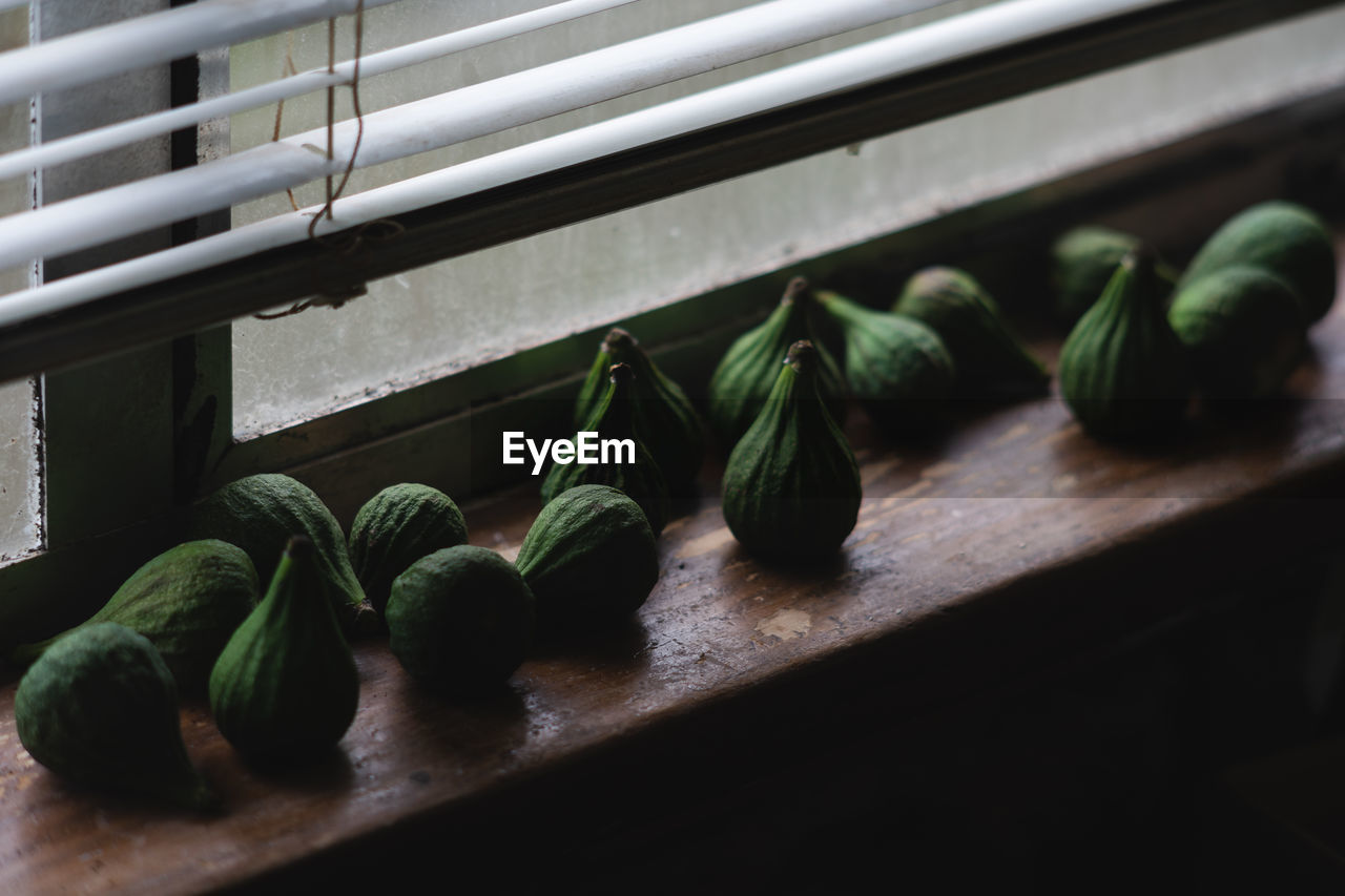 Close-up of figs on window sill