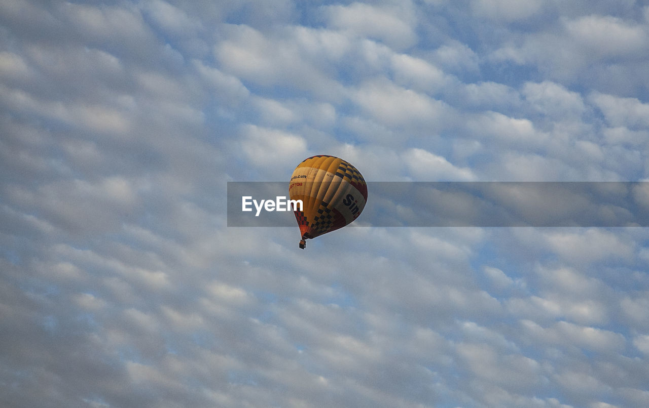 Low angle view of a hot air balloon against sky