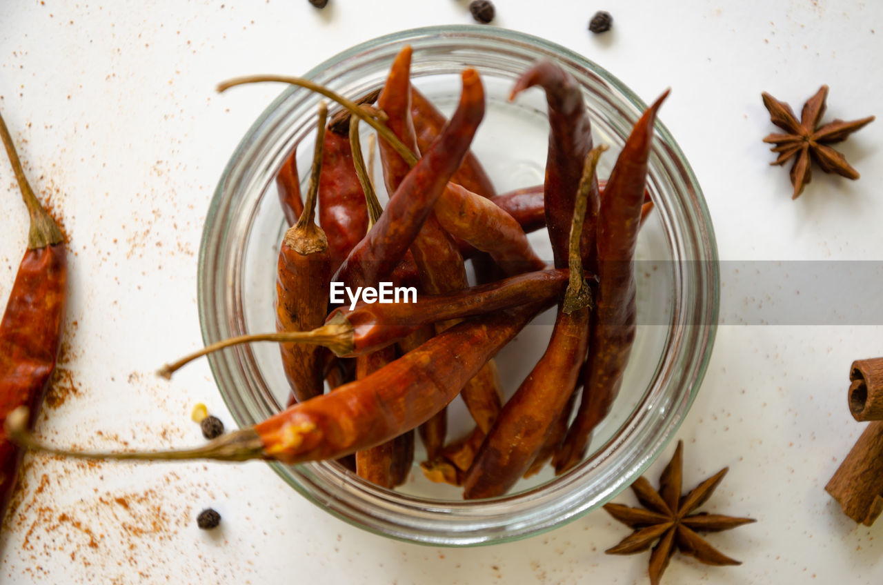 food, food and drink, spice, star anise, freshness, indoors, cinnamon, no people, healthy eating, high angle view, ingredient, wellbeing, animal, still life, directly above, seafood, produce