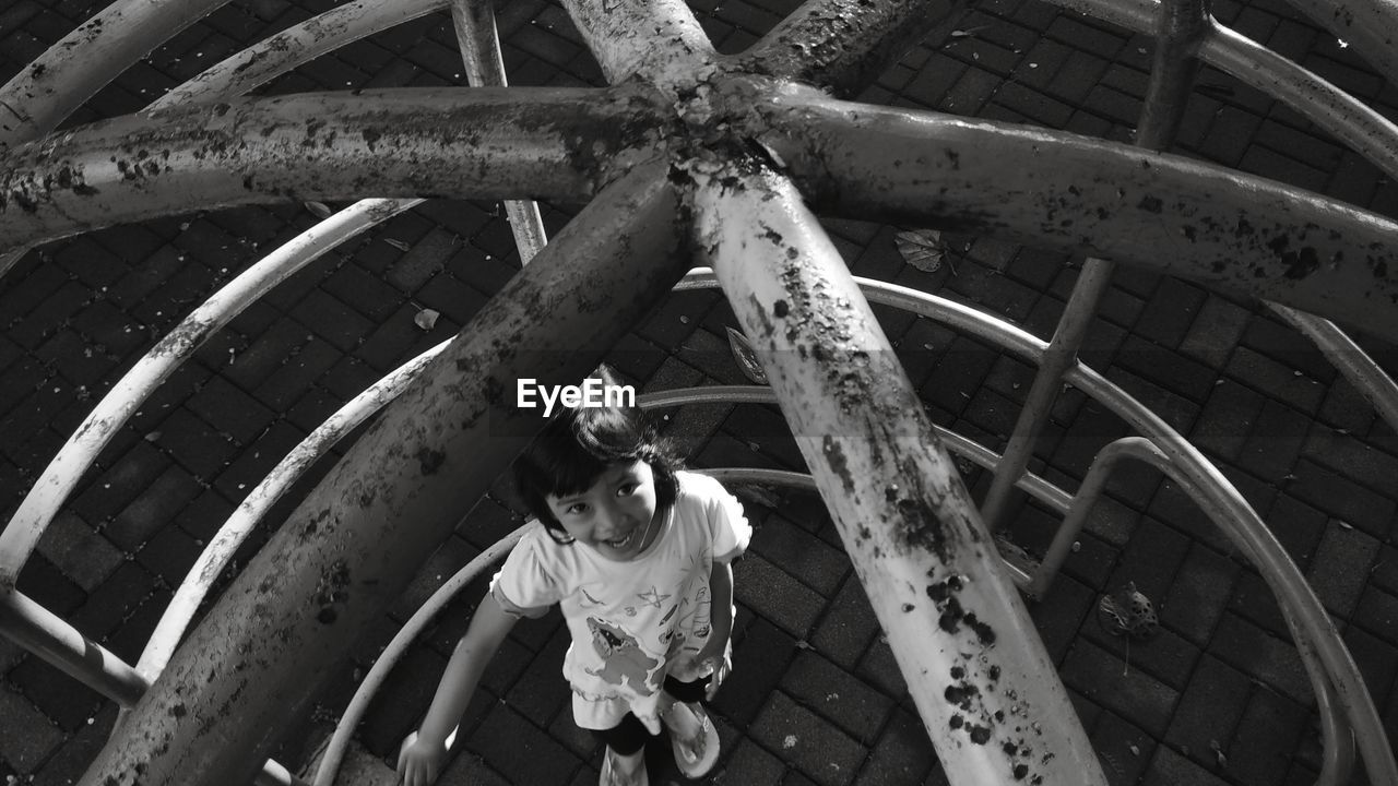 High angle portrait of girl standing on playground