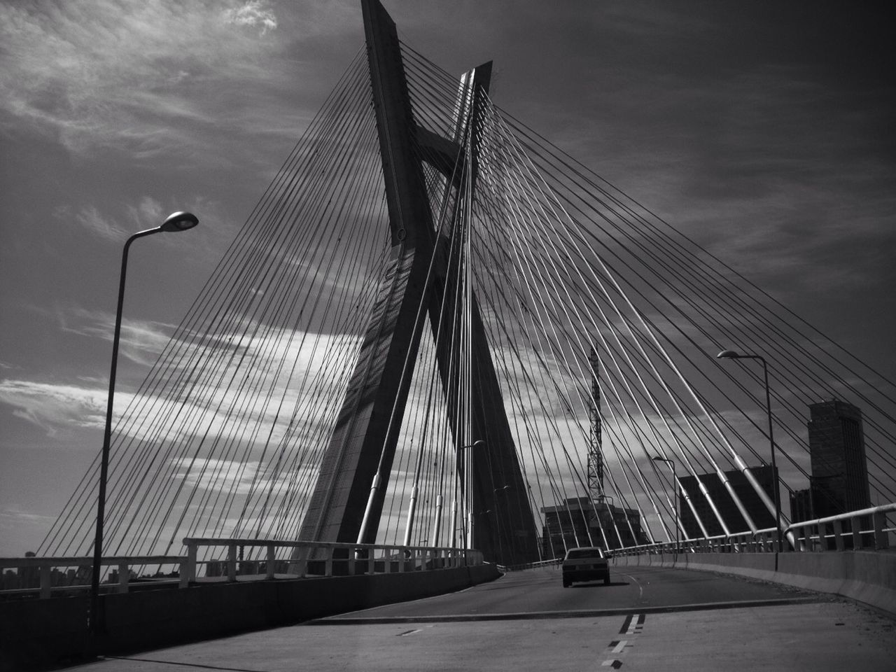 BRIDGE OVER RIVER AGAINST SKY