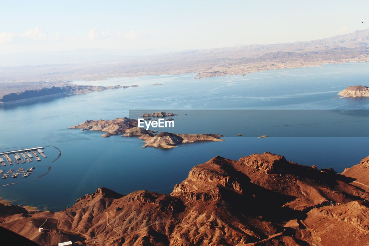 PANORAMIC VIEW OF LAKE AGAINST SKY