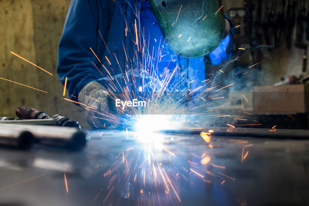 Welder working in an industrial factory