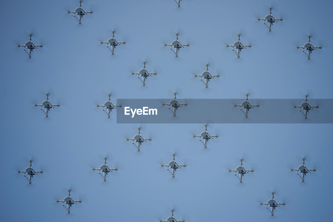 sky, wing, no people, nature, flying, airplane, air vehicle, flock, blue, shape, transportation