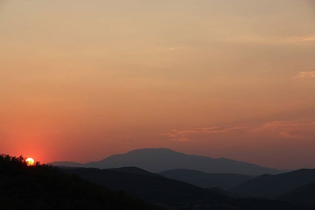 SUNSET OVER MOUNTAINS