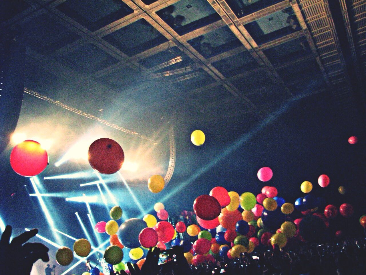 Balloons over crowd at concert