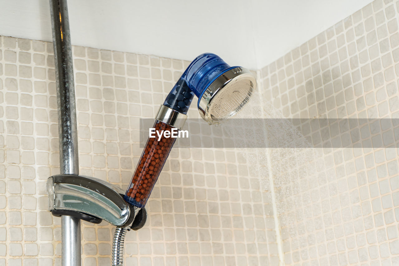 Close-up of shower in bathroom