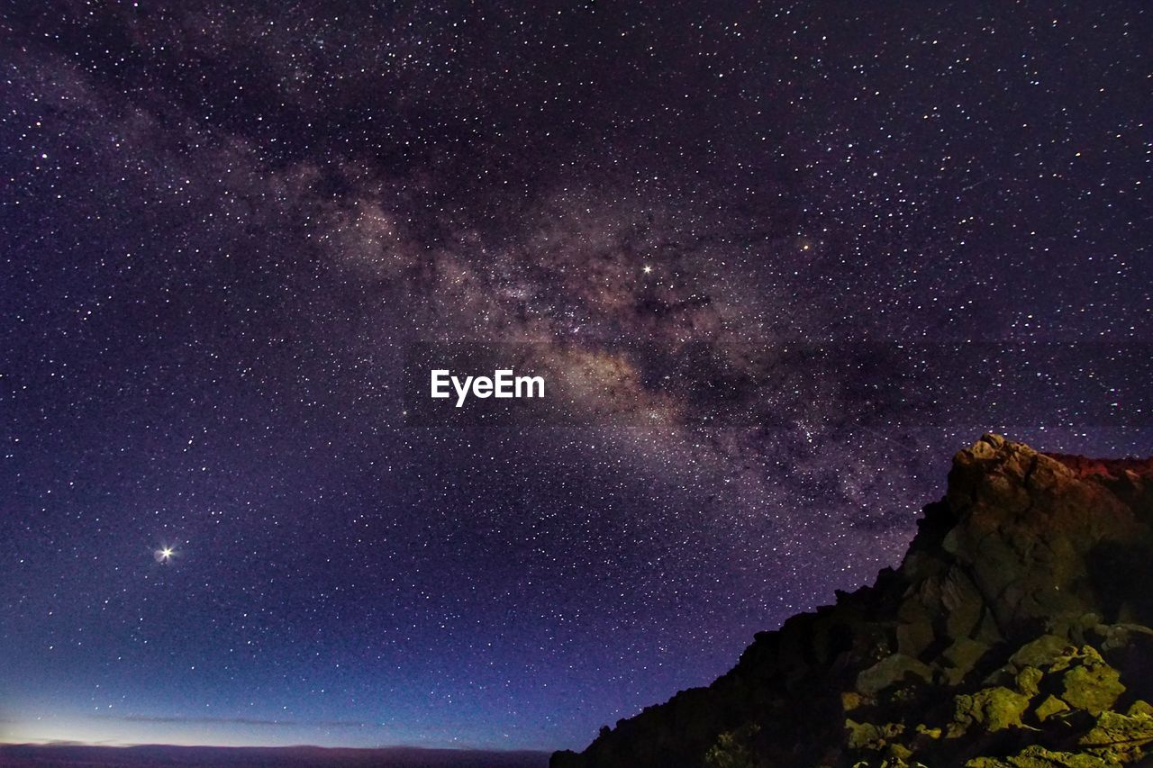 LOW ANGLE VIEW OF STAR FIELD AT NIGHT