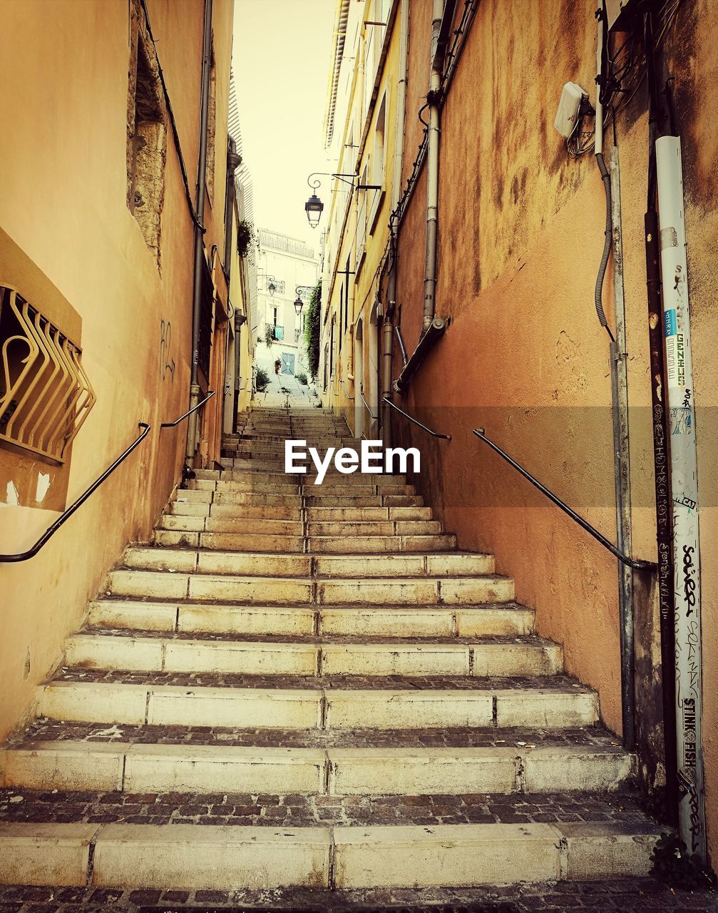 STEPS ALLEY AMIDST HOUSES