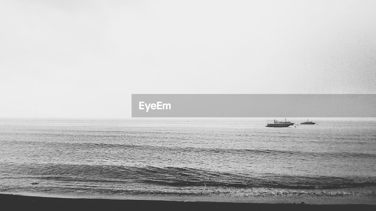 Scenic view of boats in sea