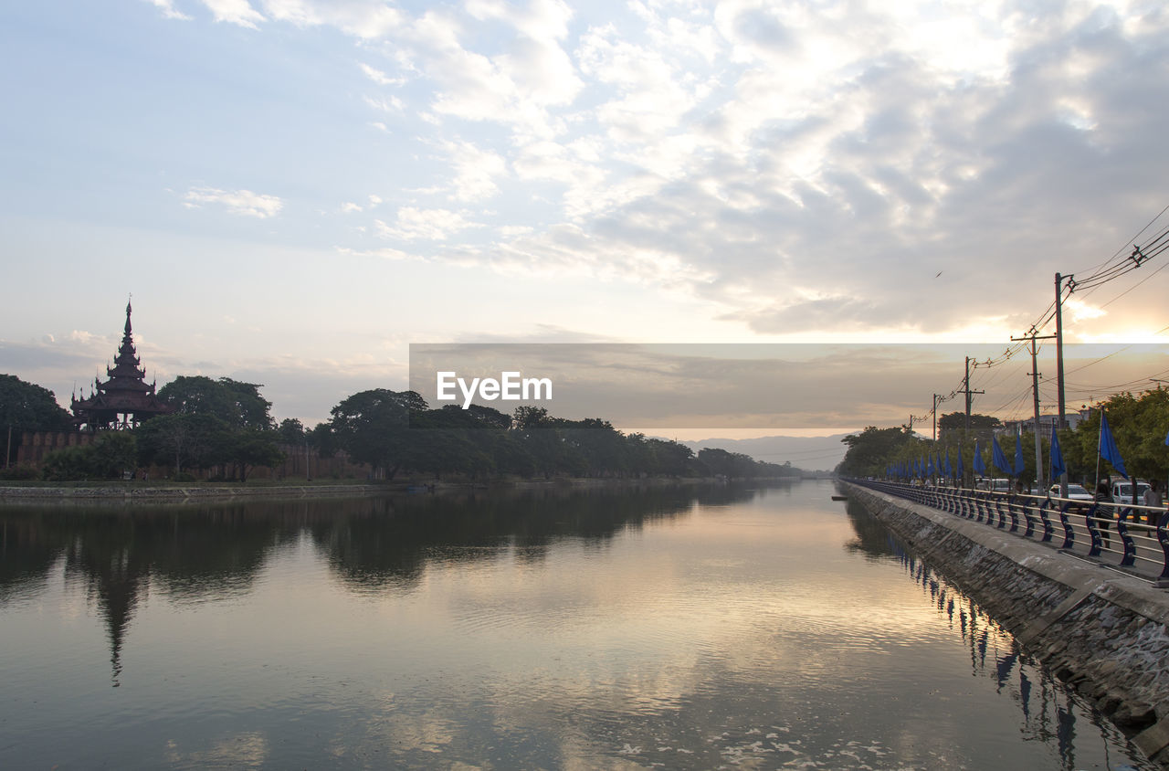 Mandalay's old city walled and water canal during sunrise