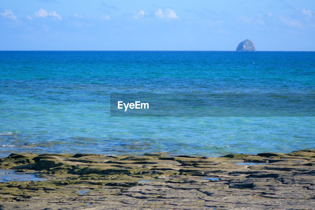 SCENIC VIEW OF SEA AGAINST BLUE SKY