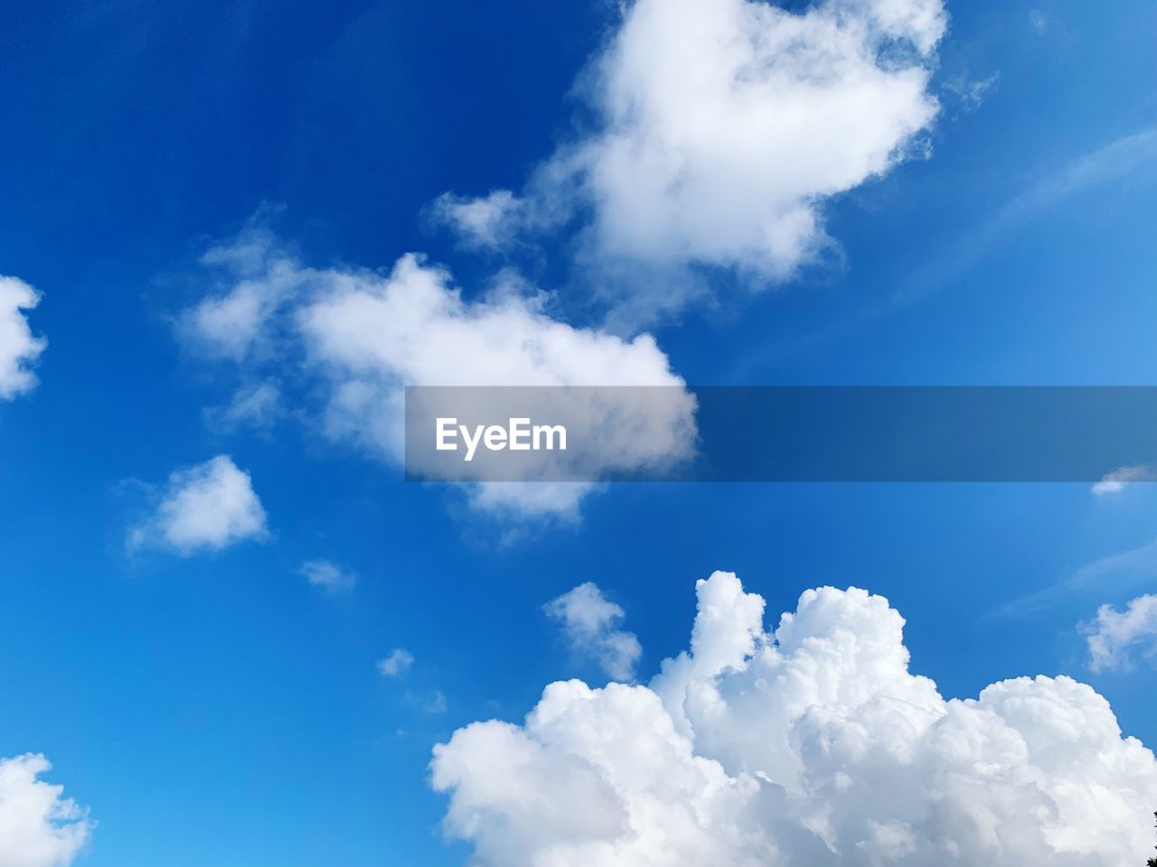 Low angle view of clouds in blue sky