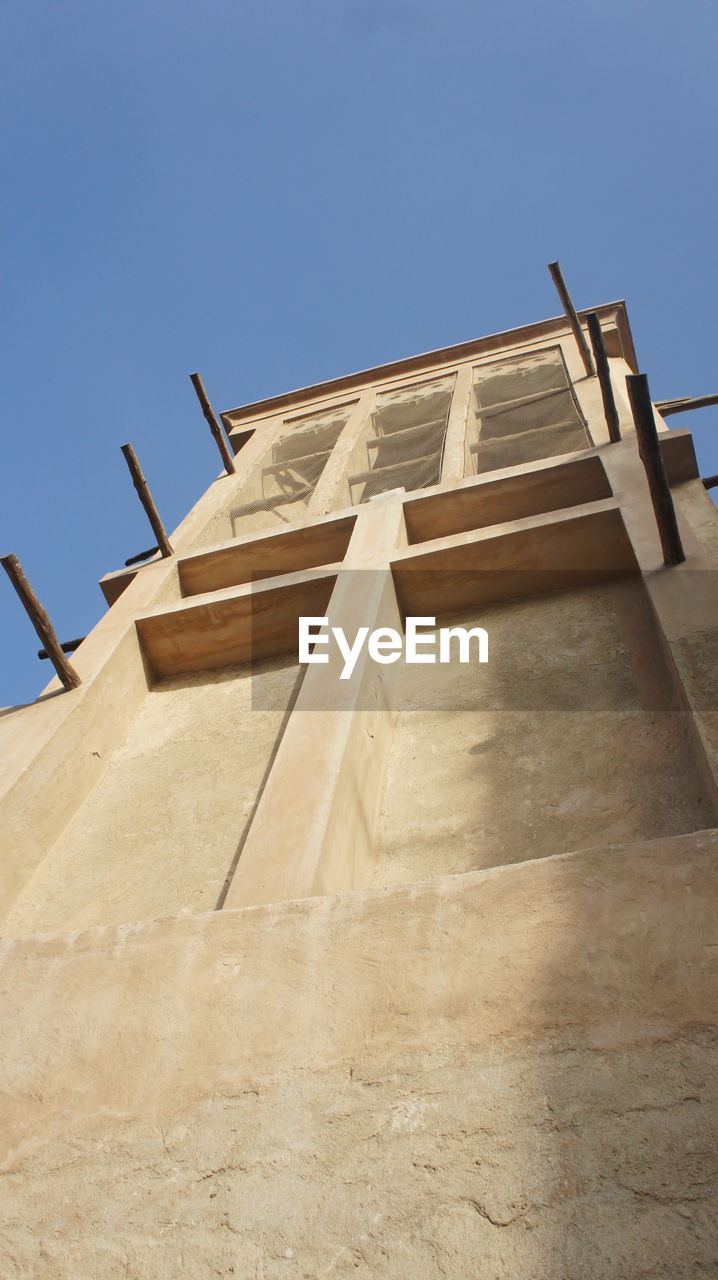 LOW ANGLE VIEW OF TOWER AGAINST CLEAR SKY