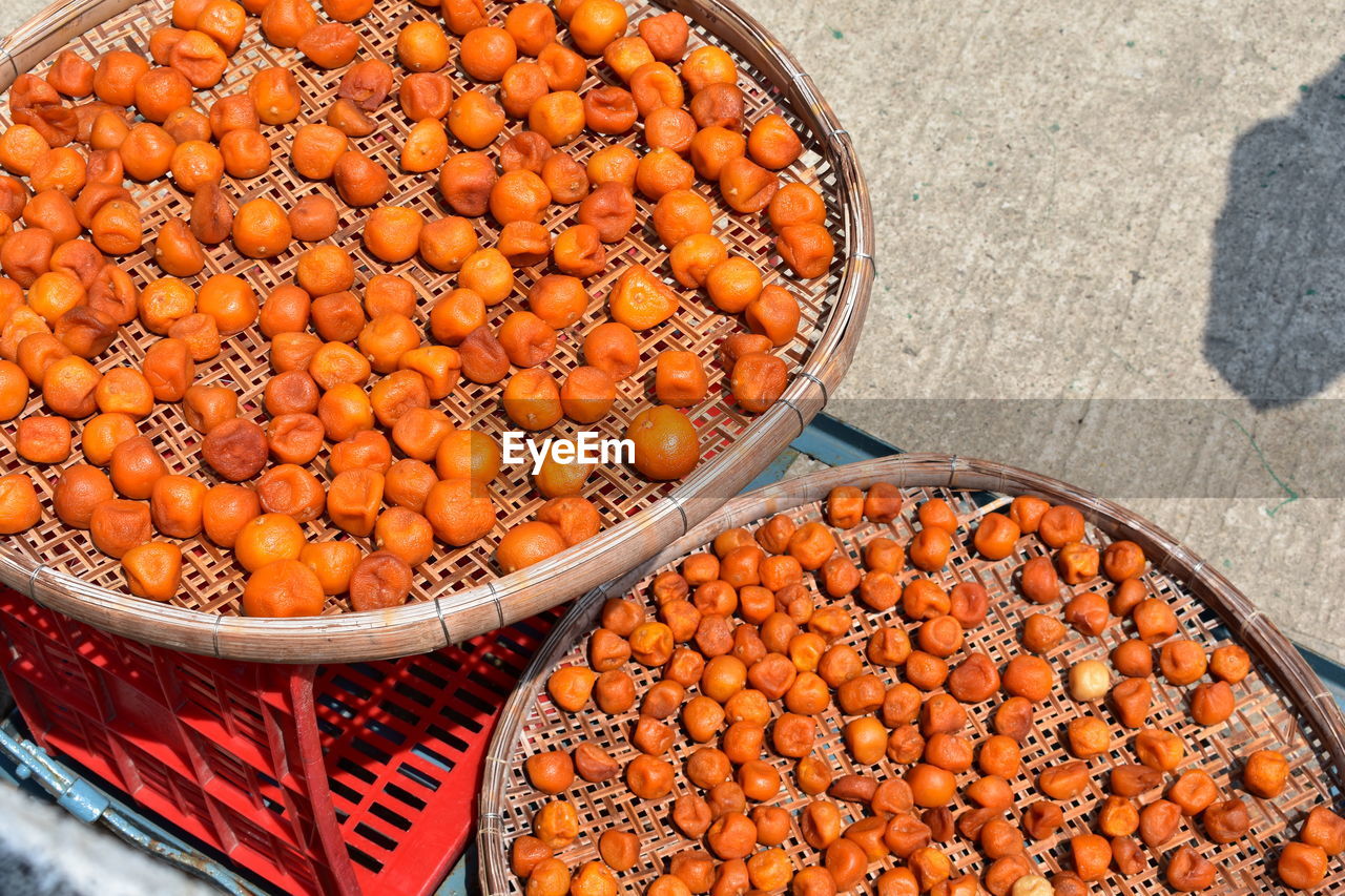 High angle view of orange fruit in market