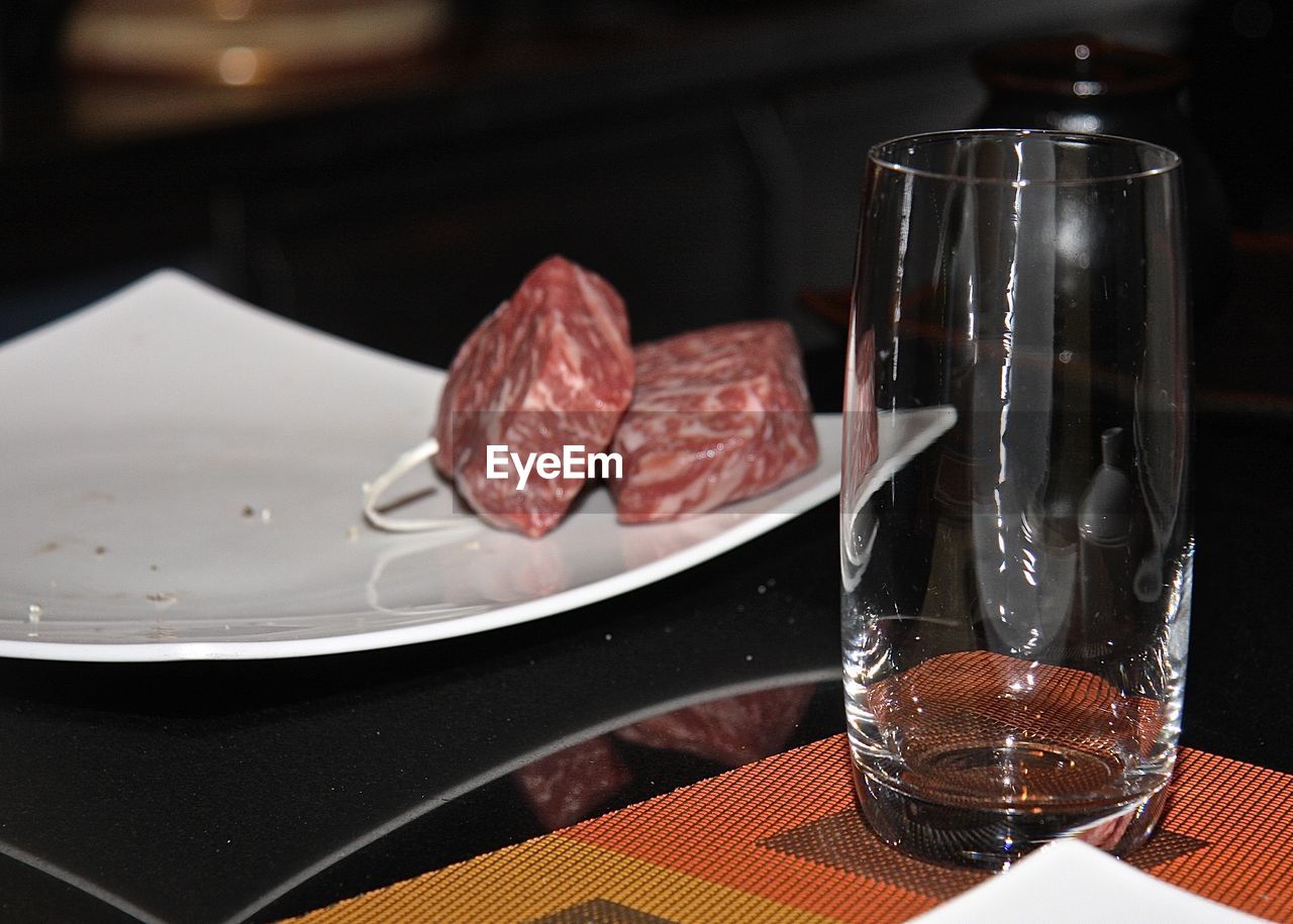 CLOSE-UP OF FOOD ON TABLE