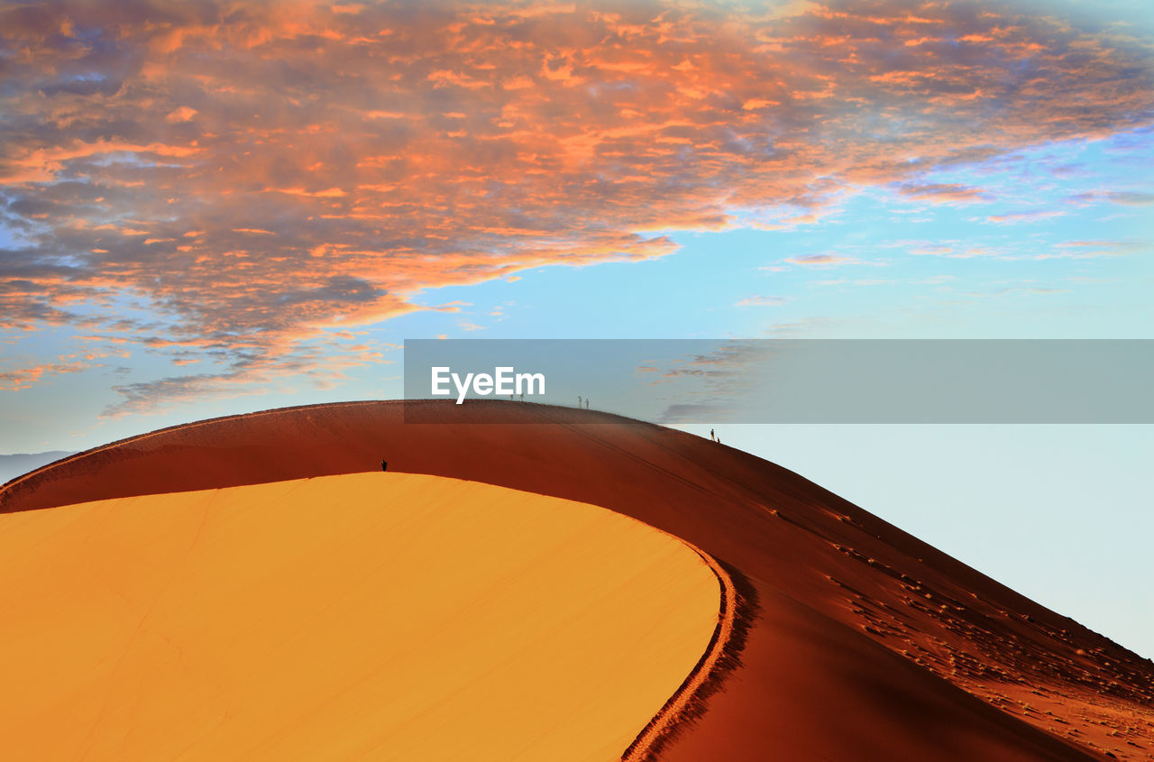 View of sandy desert against sky