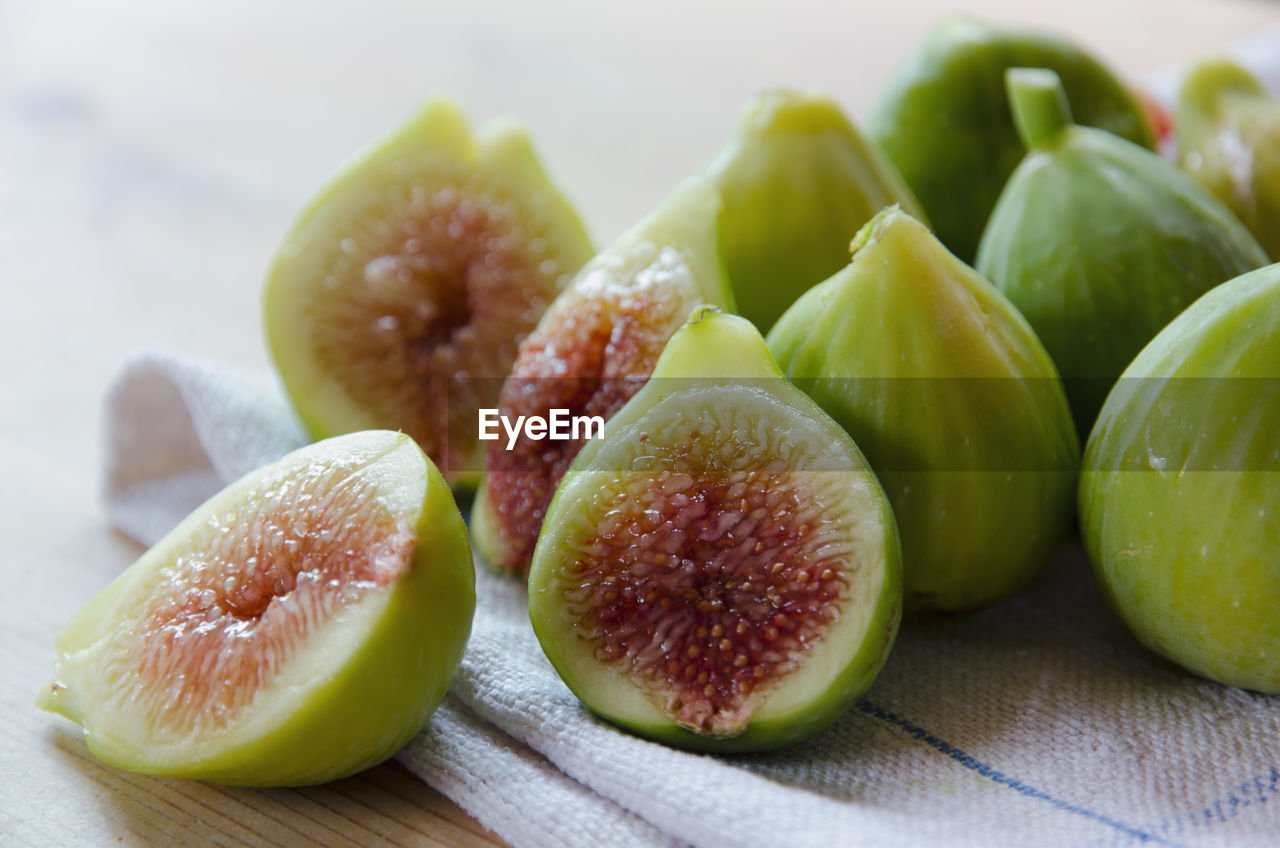 Close-up of figs on table