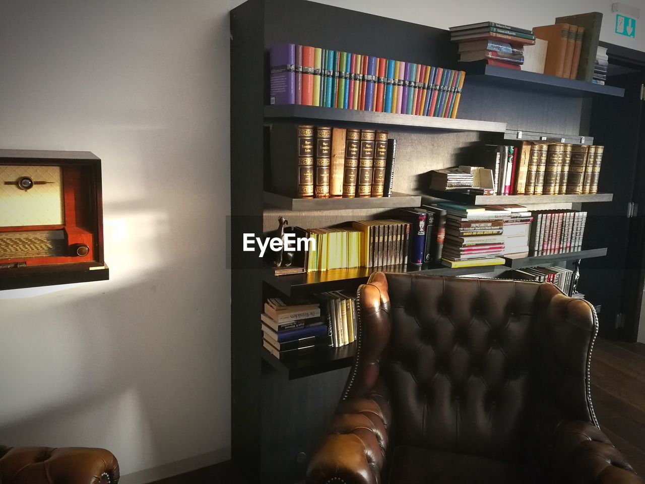 CLOSE-UP OF BOOKS ON SHELF