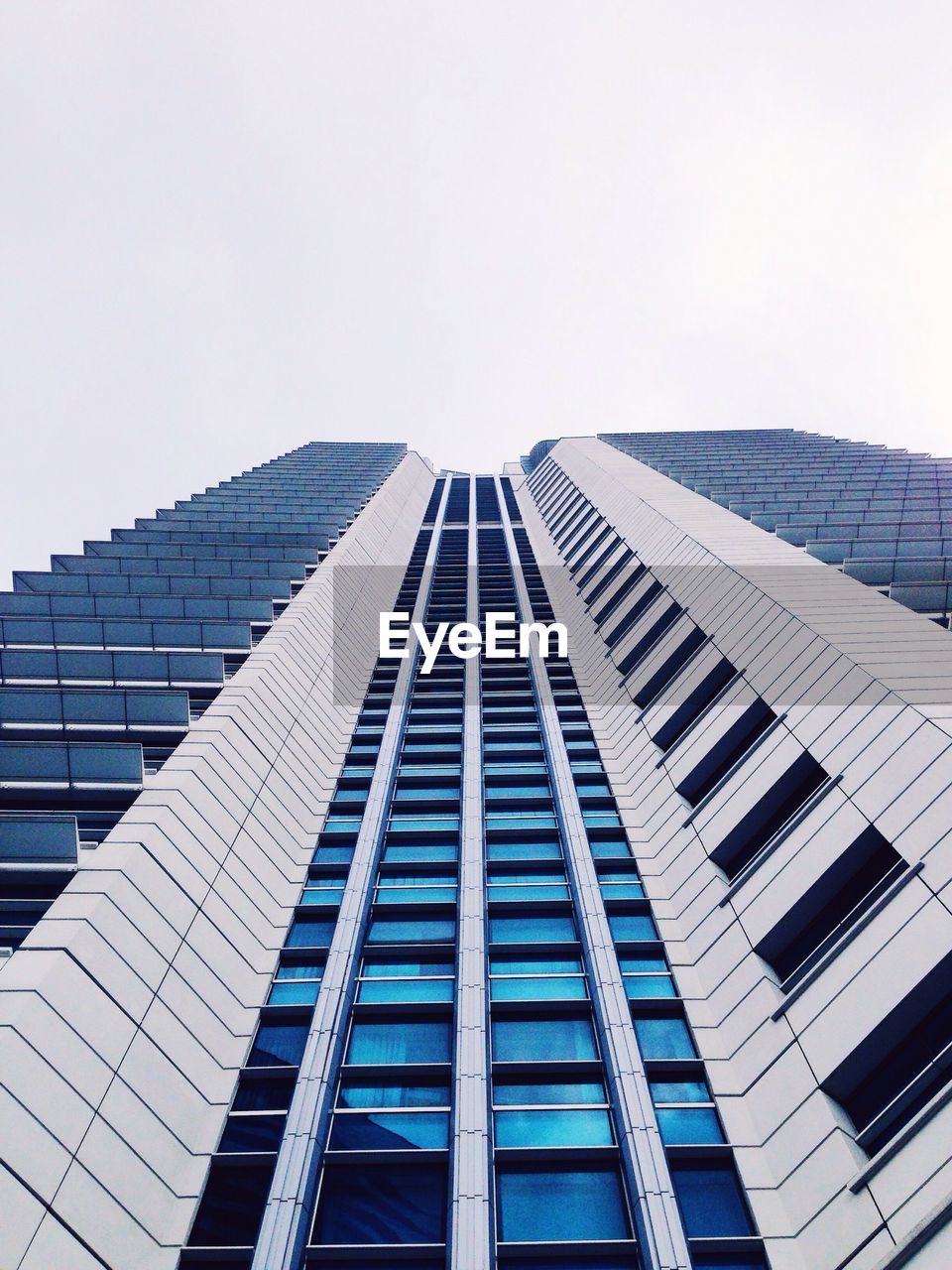 Low angle view of modern building against clear sky