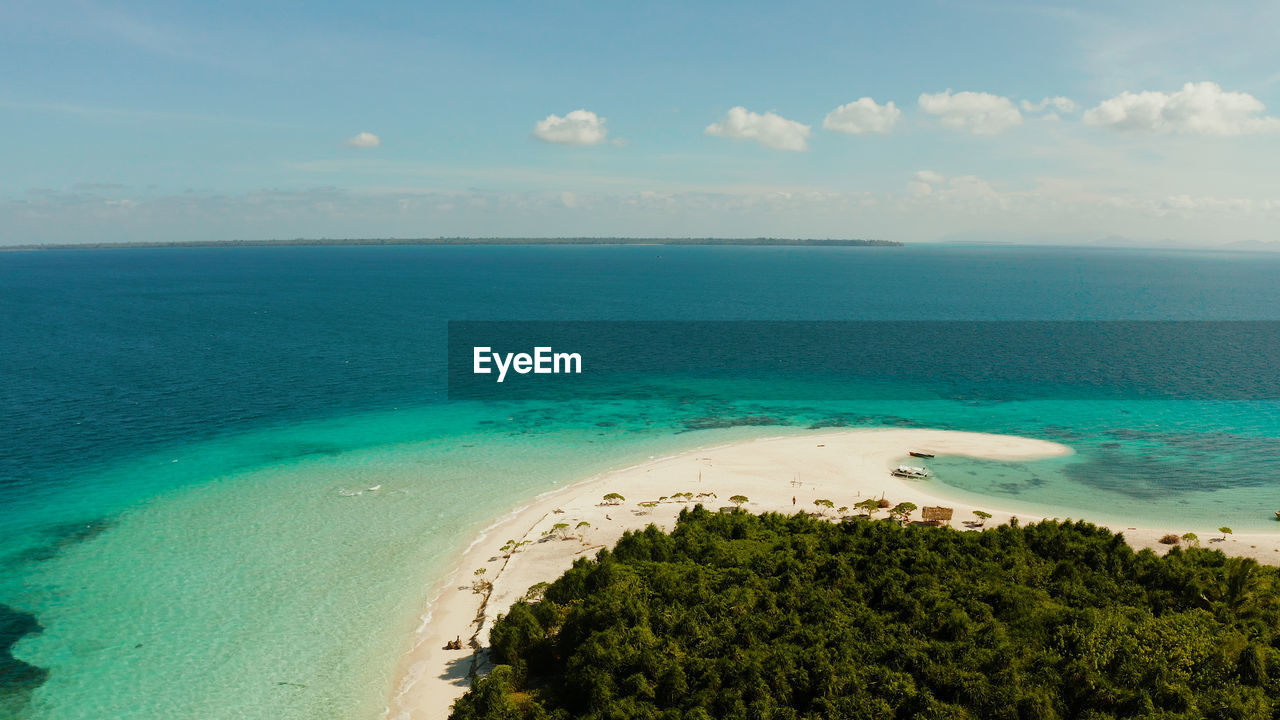 Tropical landscape small island with beautiful beach, palm tree. patawan island with sandy beach. 