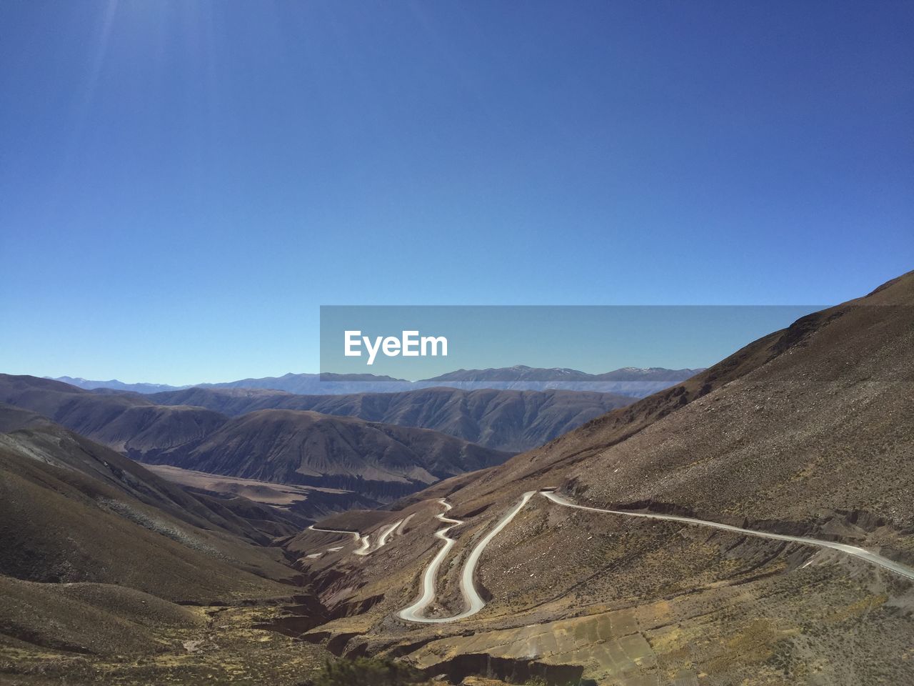 Scenic view of mountains against clear sky