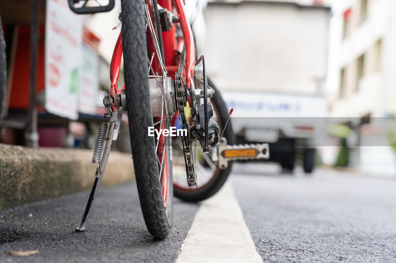 BICYCLES PARKED ON ROAD