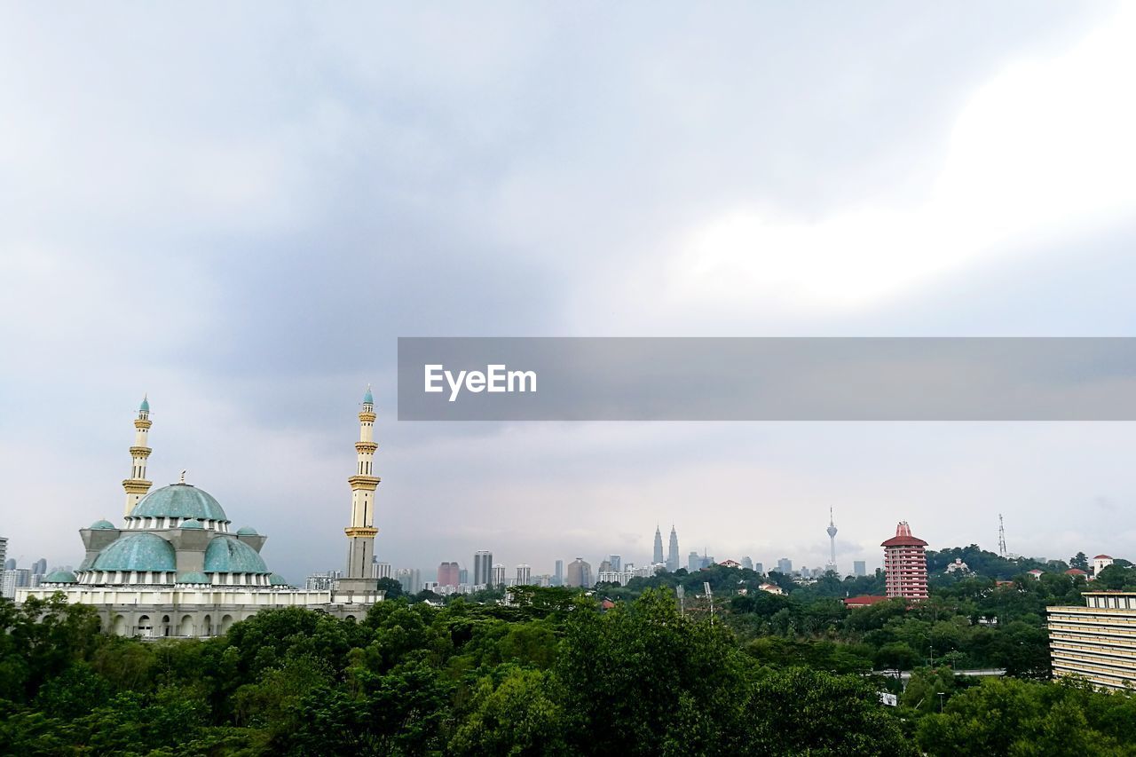 City against cloudy sky