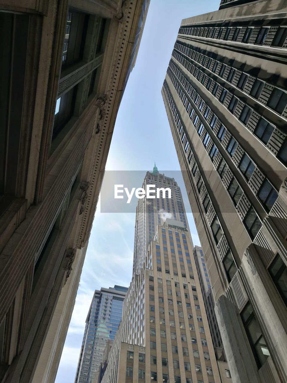 Low angle view of skyscrapers against sky