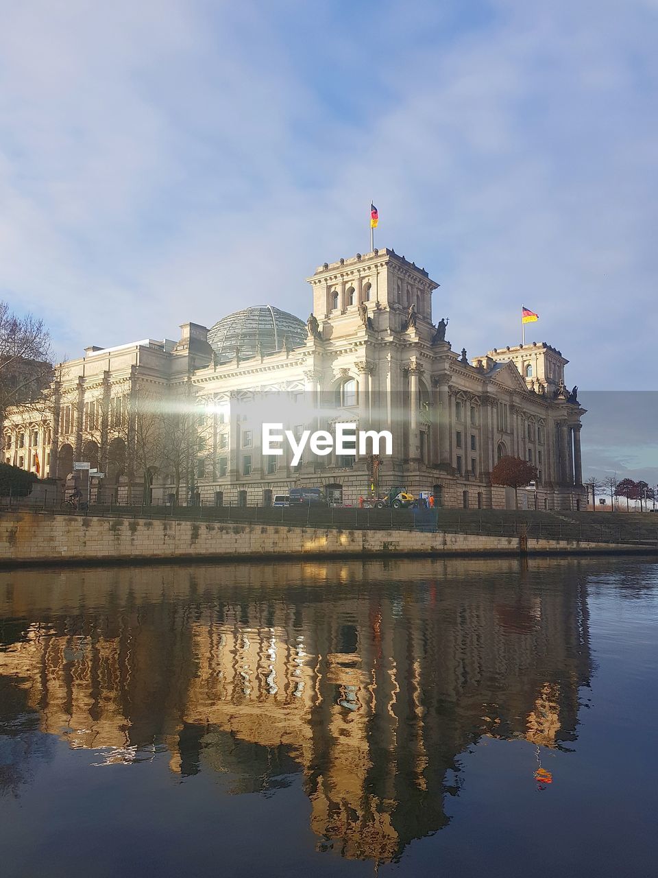 REFLECTION OF BUILDING IN WATER